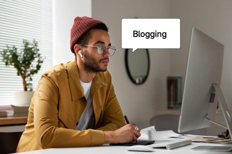 Blogger working on a laptop to build a profitable blog and earn steady online income.